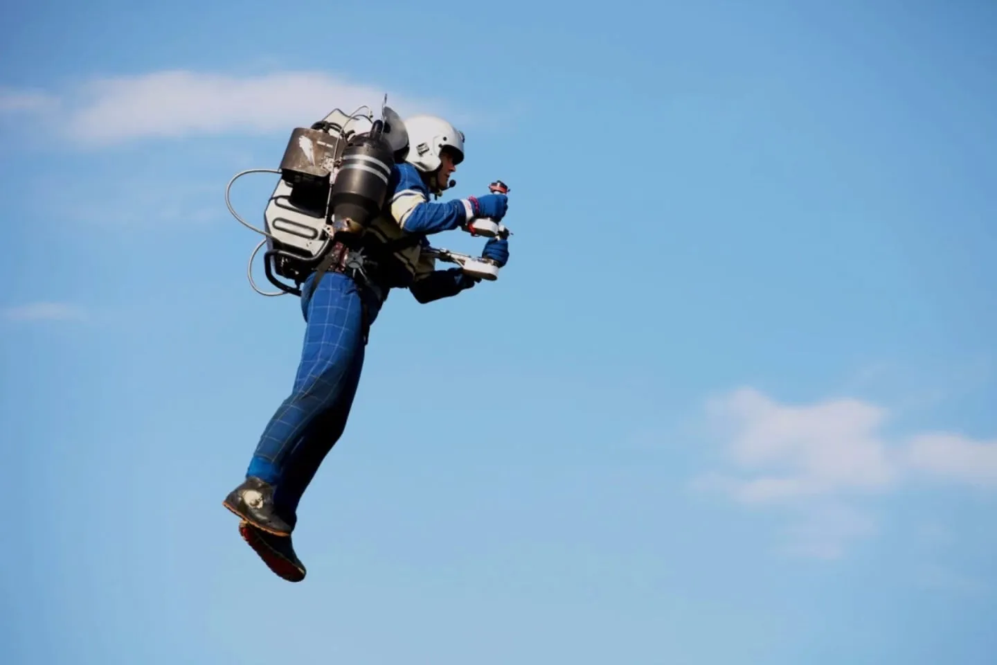 Person hovering with a jetpack.