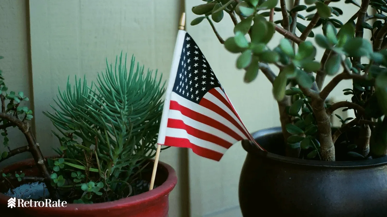 Small American Flag outside a home.