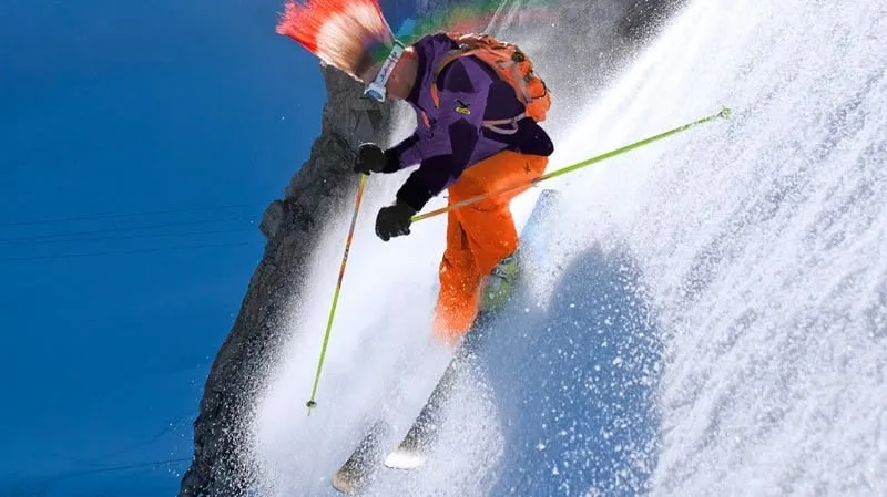Glen Plake shreds down a steep slope. He’s Cool.