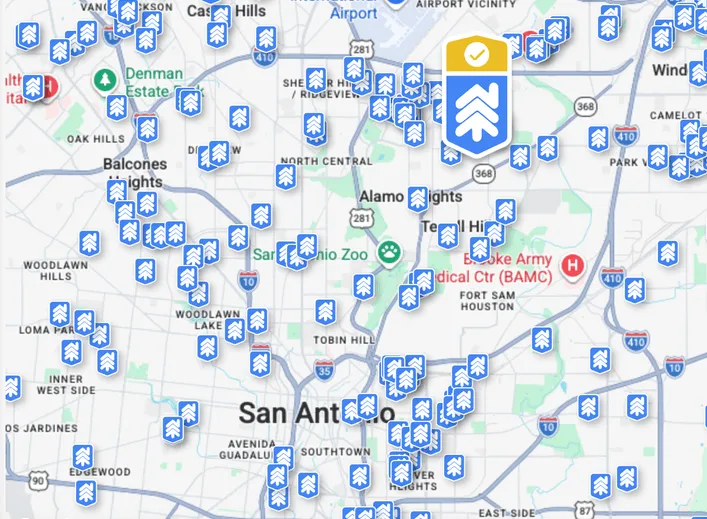Map of San Antonio covered in RetroRate pins marking homes with assumable loans, with one listing's Verified badge standing out